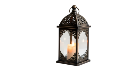 An ornate metal lantern with a lit candle isolated on transparent background