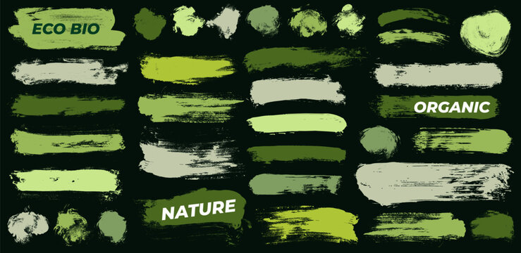 Organic green straight brush tags with rough hand drawn texture. Grunge green long brush strokes. Bold organic smears, handmade strokes for eco labels, stickers, highlights, natural design elements.