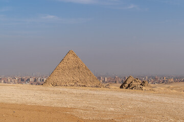 Horizontal view of the Great Pyramids of Giza Cairo with Cairo City on the background, Egypt