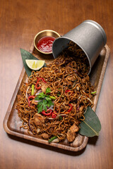 pad thai chicken stir fry noodles in modern restaurant in thailand