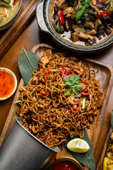 pad thai chicken stir fry noodles in modern restaurant in thailand