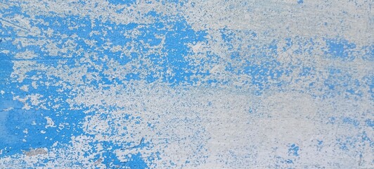 Bold blue surface displays unique textures and dynamic white patterns, evoking a sense of movement and energy in a bright, artistic setting. Ideal for inspired designs and backgrounds.