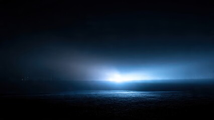 Dramatic ocean wave with bright blue light