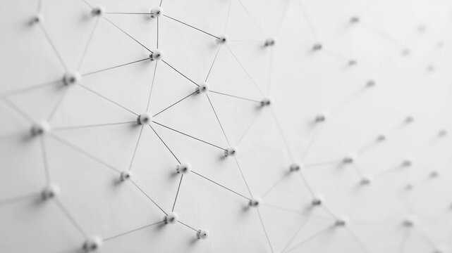 Intricate network of white threads forming geometric patterns on a textured surface