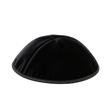 Black velvet kippah on black background
