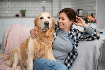 Happy Girl Hugging Her Adorable Golden Retriever Dog