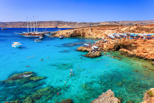 Comino Island, Malta - August 28, 2025: Blue lagoon and Gozo Island in the background.