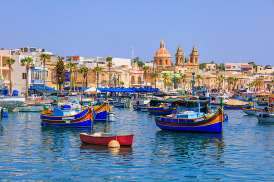 Traditional fishing boats in the Mediterranean Village of Marsaxlokk, Malta