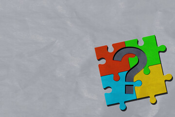 Colorful puzzle with a question mark symbol. Concept of question, FAQ, Q and A, confusion and solution. question and answer concept
