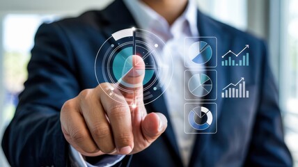 A professional in a suit interacts with a transparent digital display showcasing data visualizations like charts and graphs indicating modern technology