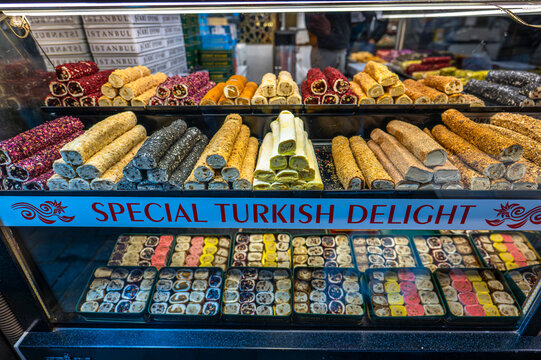 Istanbul, Turkey - January 03, 2026: A colorful display of traditional Turkish Delight (Lokum) rolls and assorted sweets in a shop window at the Spice Bazaar
