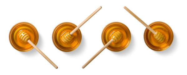 Honey bowl with wooden dipper in different positions isolated on white background. High-quality PNG ideal for packaging, branding and food design.