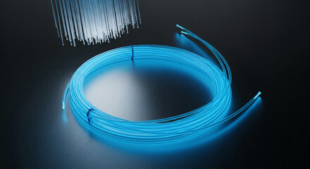 Bundle of blue fiber optic cables in a coil shape on a dark surface, representing high-speed internet, modern communication, and technological advancement
