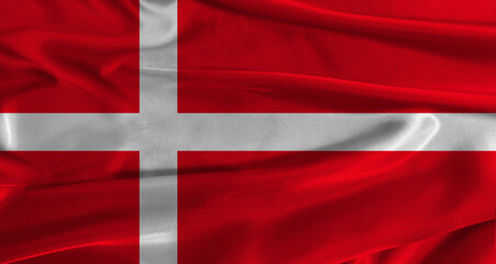 Obraz premium Flag of Denmark with fabric textured background. Close up of National flag of Denmark with realistic texture