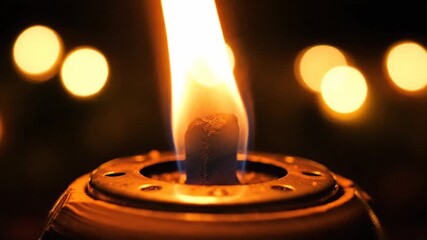 Burning Candle Flame Glowing in Darkness Calm Atmospheric Light