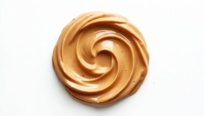 Creamy peanut butter swirled on white surface. Smooth, spreadable nut paste for sandwiches and snacks. Rich texture, healthy protein source for tasty meals.