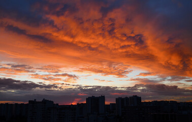 Beautiful panoramic sunset with city on the horizon