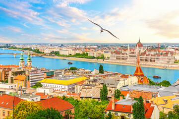 Aerial view of Parliament and Buda Churches with Danube river, summer panorama of Budapest, Hungary