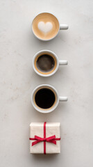 Vertical flat lay: espresso and gift aligned at bottom, clean space above.