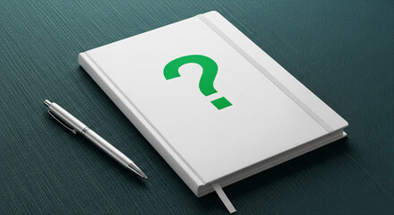 Closed white notebook with green question mark and silver pen on dark green textured surface, representing inquiry, knowledge, doubt, question mark design