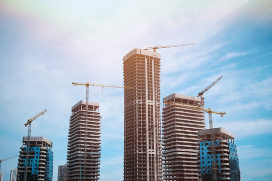 Tall modern building being built from concrete. High quality photo