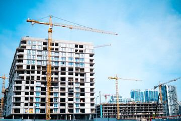 Tall modern building being built from concrete. High quality photo