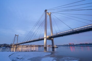 The suspension bridge in Krpasnoyarsk is Vinogradovsky bridge, one of the symbols of the city. High quality photo