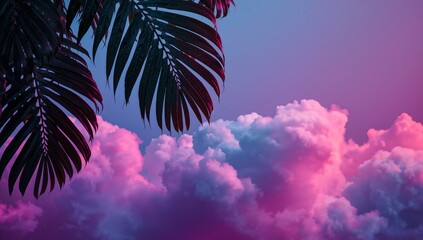 Dark tropical palm leaves frame a dramatic sunset sky filled with vibrant pink and purple illuminated cumulonimbus clouds creating a dreamy aesthetic backdrop