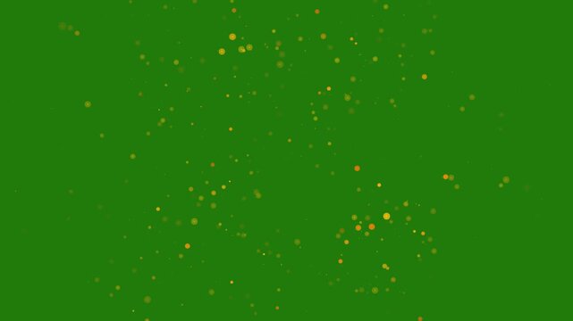 Gold Explosion effect. Festive Fireworks on green background. Golden Glitter Particle Explosion, Floating golden sparkles. Glowing Particles Overlay, particles softly bursting and forming light, 4k