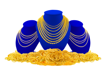 Gold necklace sits on a display stand, while a blue necklace is placed on a pile of gold necklaces