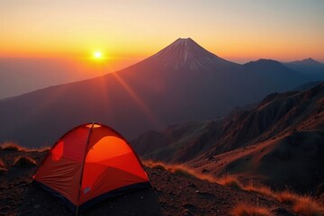 Golden sunrise crests above Bromo volcano, tent view , sun, mist, asia