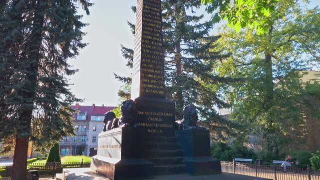 Monument to Russian Field Marshal Mikhail Kutuzov in Boleslawiec, Poland. Historic memorial at the site of his death in 1813, surrounded by a park and traditional architecture in Lower Silesia.