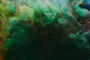 Abstract green background. Moving smoke flow, fluid liquid art.