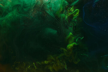 Abstract green background. Moving smoke flow, fluid liquid art.