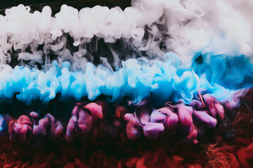 Abstract colorful smoke background. Moving flow of blue, red, white paints, fluid art