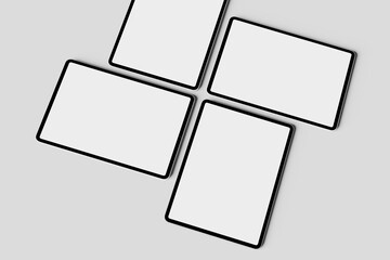 Modern Multi Tablet Mockup with Four Blank Screens in Minimal Flat Lay Composition