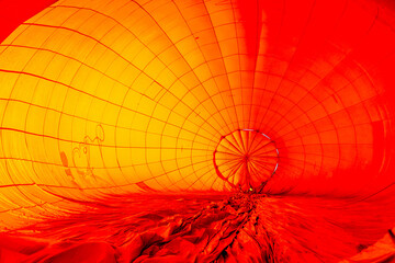 The inside of a brightly colored balloon with hot air inside