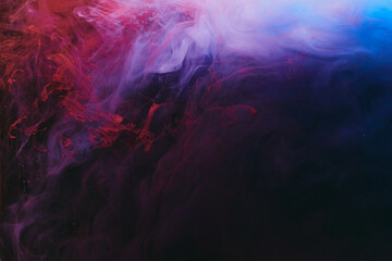 Abstract colorful smoke background. Moving flow of blue, red, white paints, fluid art