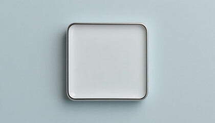 Blank white plate on light blue background for food presentation