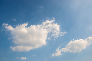 beautiful blue sky and white fluffy cloud horizon outdoor for background.