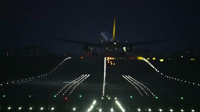 Commercial Twin-Engine Passenger Aircraft Landing in Strong Crosswinds at Night