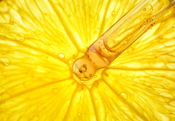 Cosmetic vitamin ampoule serum with glass pipette dropper. Beauty product sample swatch