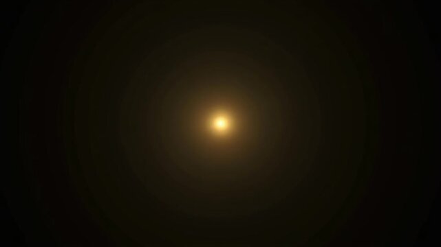 黒闇に灯る金点が広がる円形光演出