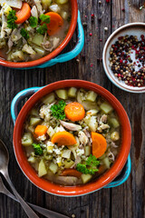 Krupnik - polish barley soup with chicken. Top view