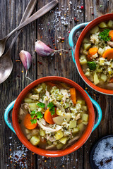 Krupnik - polish barley soup with chicken. Top view