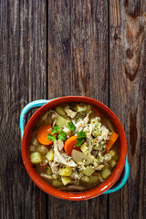 Krupnik - polish barley soup with chicken. Top view