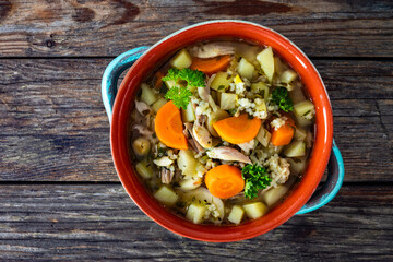 Krupnik - polish barley soup with chicken. Top view