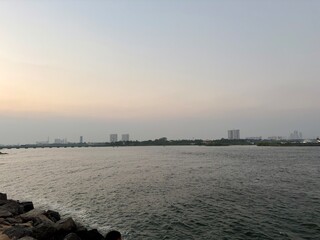Sunset over the sea. Waterfront scene.