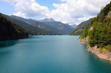 panoramic view of lake sauris in the carnia region of northeast italy and the surrounding mountains