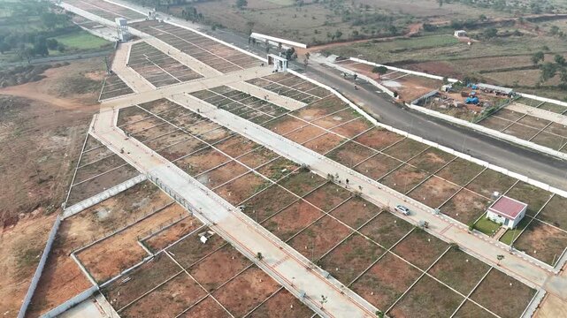 Aerial View of Emerging Development Area Near Bangalore &ndash; Planned Residential Plots, New Road Infrastructure, and Urban Expansion Toward Hosur and Devanahalli Corridors